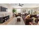 Bright and airy living room features modern finishes, neutral paint, and comfortable seating arrangements at 5808 S 12Th Ln, Phoenix, AZ 85041