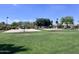 Community park featuring a basketball court, volleyball court, and lush green space at 6049 S Wilson Dr, Chandler, AZ 85249