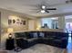 Spacious living room featuring comfortable seating, a ceiling fan, and stylish decor at 6049 S Wilson Dr, Chandler, AZ 85249