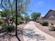 A paved walking path winds through a well maintained common area at 6049 S Wilson Dr, Chandler, AZ 85249