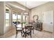 Cozy breakfast nook with lots of natural light and stylish furniture at 6131 S Bradshaw Way, Chandler, AZ 85249