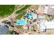 Aerial view of the community swimming pools, with ample lounge chairs for residents' relaxation and enjoyment at 6131 S Bradshaw Way, Chandler, AZ 85249