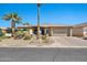 Charming home with a well-manicured yard, palm trees, and a spacious two-car garage at 6131 S Bradshaw Way, Chandler, AZ 85249