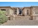 Inviting front entrance with stone accents, lovely front door, and cozy seating area at 6131 S Bradshaw Way, Chandler, AZ 85249