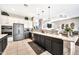 Well-equipped kitchen with modern appliances and great flow to the living room at 6131 S Bradshaw Way, Chandler, AZ 85249