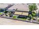 An aerial perspective showcases the home's rear exterior, featuring a covered patio and an inviting outdoor space at 6131 S Bradshaw Way, Chandler, AZ 85249