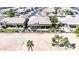 Aerial view of the property's rear exterior with a covered patio, well-maintained landscaping, and a decorative fountain at 6131 S Bradshaw Way, Chandler, AZ 85249