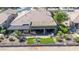 This aerial shot highlights the back of the house, complete with a covered patio ideal for outdoor relaxation and entertaining at 6131 S Bradshaw Way, Chandler, AZ 85249