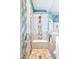 Detailed shower with a built-in bench, shower head, and tiled surround create a luxurious showering experience at 6131 S Bradshaw Way, Chandler, AZ 85249