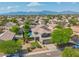 Beautiful two-story home featuring a well-manicured lawn and inviting curb appeal in a lush neighborhood at 6321 W Gross Ave, Phoenix, AZ 85043