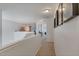 Open and airy hallway offering seamless transition to other living spaces at 6321 W Gross Ave, Phoenix, AZ 85043
