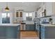 Well-designed kitchen featuring stainless steel appliances and a large farmhouse sink at 6321 W Gross Ave, Phoenix, AZ 85043