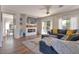 Spacious living room with fireplace, stylish decor, and comfortable seating area at 6321 W Gross Ave, Phoenix, AZ 85043