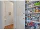 Organized pantry with ample shelving for food storage at 6321 W Gross Ave, Phoenix, AZ 85043