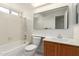 Bathroom with shower and bath at 643 W Medina Ave, Mesa, AZ 85210