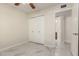 Bedroom with double door closet, ceiling fan and marble flooring is move-in ready at 643 W Medina Ave, Mesa, AZ 85210