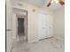 Bedroom with double door closet, ceiling fan and marble flooring is move-in ready at 643 W Medina Ave, Mesa, AZ 85210