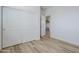 Bright bedroom with a large closet space and wood floors at 644 N Vine St, Chandler, AZ 85225