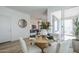 Elegant dining area featuring a sliding glass door and stylish furnishings at 644 N Vine St, Chandler, AZ 85225