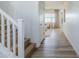 Bright hallway with wood floors, white trim, leading to a sunlit living area at 644 N Vine St, Chandler, AZ 85225