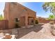 The home features a covered patio and desert landscaping at 7029 S Golfside Ln, Phoenix, AZ 85042