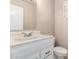 Bathroom with single sink vanity, tile floor, and toilet at 7029 S Golfside Ln, Phoenix, AZ 85042