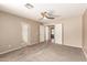 Bedroom featuring carpeted floors and a ceiling fan at 7029 S Golfside Ln, Phoenix, AZ 85042
