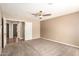 Bedroom featuring carpeted floors and a ceiling fan at 7029 S Golfside Ln, Phoenix, AZ 85042