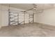 Spacious garage with concrete floor and white walls, ample for parking and storage at 7029 S Golfside Ln, Phoenix, AZ 85042
