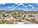 Neighborhood aerial view showcasing lush desert landscaping and mountain views at 833 N 110Th St, Mesa, AZ 85207