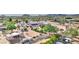 Desert neighborhood aerial view featuring mature native trees and mountain backdrop at 833 N 110Th St, Mesa, AZ 85207