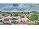 Desert neighborhood featuring custom homes with generous lots and mature trees at 833 N 110Th St, Mesa, AZ 85207