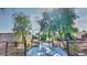 Bridge spanning the decorative stream in the backyard oasis at 833 N 110Th St, Mesa, AZ 85207