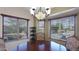 Dining room with wood table, upholstered chairs, and natural light at 833 N 110Th St, Mesa, AZ 85207