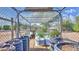 Interior view of the greenhouse shows plant starts and a thermometer to monitor growing conditions at 833 N 110Th St, Mesa, AZ 85207