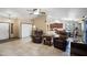 Open living space with tile floors, neutral paint, and comfortable seating at 833 N 110Th St, Mesa, AZ 85207