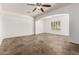 Spacious living room with tiled flooring and bright natural light at 915 W Orchard Ln, Litchfield Park, AZ 85340