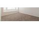 Cozy bedroom featuring neutral walls, carpet flooring, and large windows for ample natural light at 925 S Longmore -- # 201, Mesa, AZ 85202
