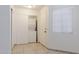 Clean laundry room with stacked washer and dryer and natural light at 925 S Longmore -- # 201, Mesa, AZ 85202