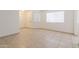 Bright living room with neutral color palette and tile flooring at 925 S Longmore -- # 201, Mesa, AZ 85202