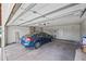 Spacious garage with a parked car, offering storage and parking space at 9654 E Foster Ave, Sun Lakes, AZ 85248