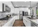 Gourmet kitchen with granite countertops, stainless steel appliances, and ample cabinet space at 974 W Zion Way, Chandler, AZ 85248