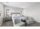 Bright main bedroom with large bed, sitting area, and neutral color palette at 974 W Zion Way, Chandler, AZ 85248