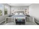 Inviting main bedroom showcasing a king-sized bed, two armchairs, and soft natural light at 974 W Zion Way, Chandler, AZ 85248