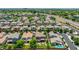 Aerial view of a beautiful neighborhood with well-kept lawns, mature trees, and stunning community amenities at 974 W Zion Way, Chandler, AZ 85248