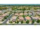 Aerial view of a peaceful residential neighborhood with tidy streets, mature trees, and well-cared-for homes at 974 W Zion Way, Chandler, AZ 85248