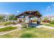 Community park pavilion featuring a picnic table and nearby playground at 974 W Zion Way, Chandler, AZ 85248