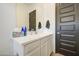 Modern bathroom featuring a vanity with white countertops at 9845 E Thistle Ave, Mesa, AZ 85212