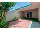 Enclosed backyard with brick patio area and partial artificial turf, providing a private outdoor space at 9929 W Thunderbird Blvd, Sun City, AZ 85351