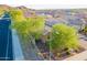 Aerial view of a home in a neighborhood with sidewalks and street lights at 10207 W Hedge Hog Pl, Peoria, AZ 85383